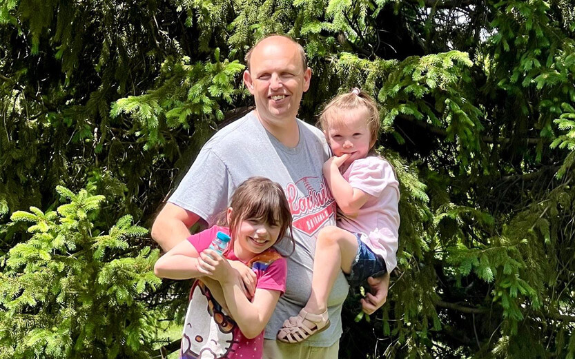 father with his two young children