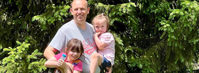 father with his two young children