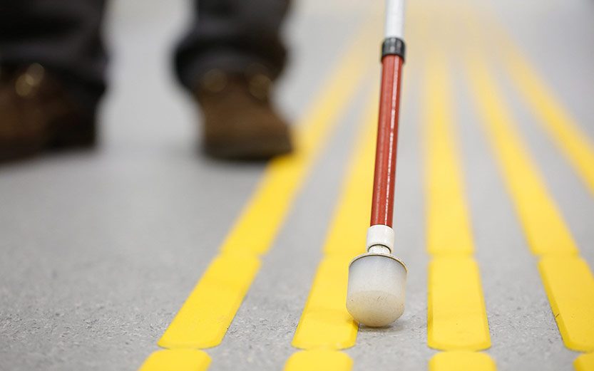 A person using a walking cane.