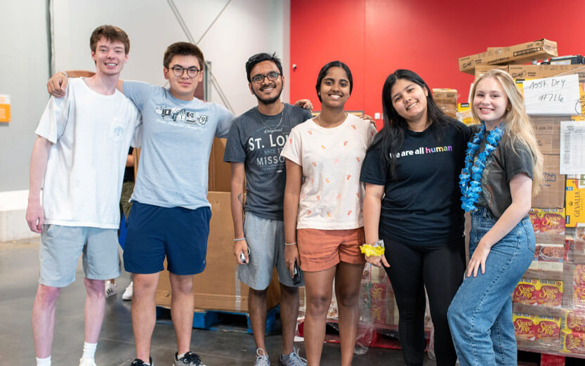 group of high schoolers volunteering