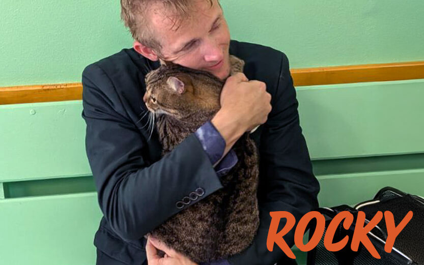 Rocky the cat and his owner