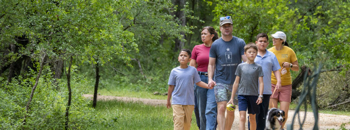 family walking in park