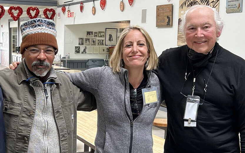 three volunteers at the center