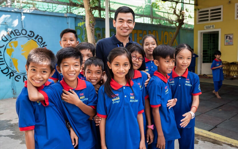 a group of school children with their teacher