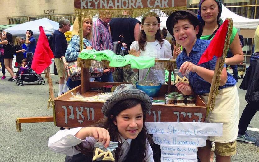 four kids at a keynahora cart