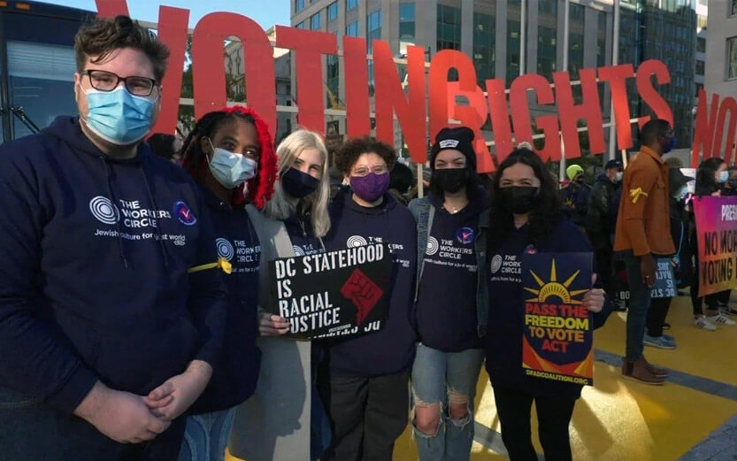 a group of demonstrators for voting rights