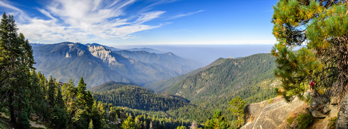 view of a valley from atop a mountain