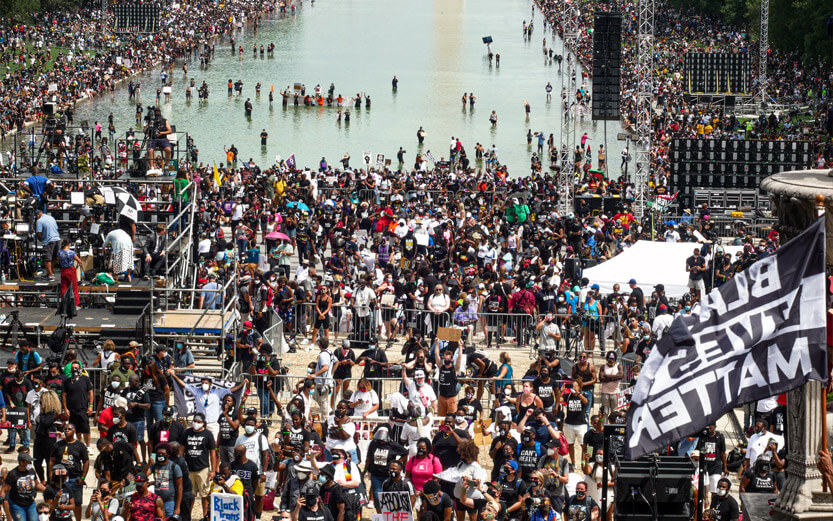 overview shot of a large crowd at a black lives matter rally in washington dc