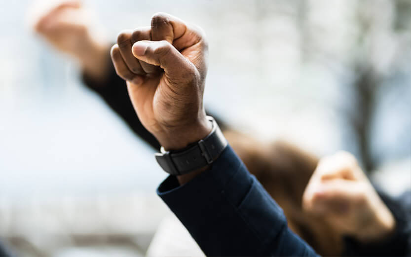 close up of a raised black fist