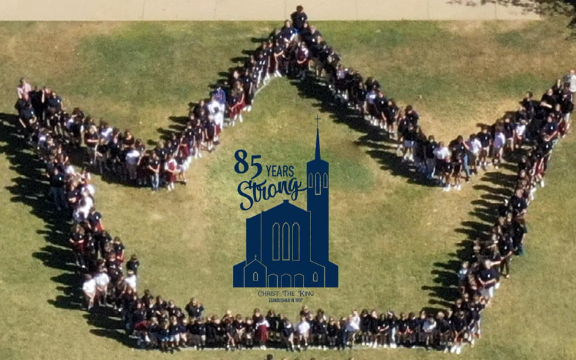 aerial view of a group of people forming the shape of a crown