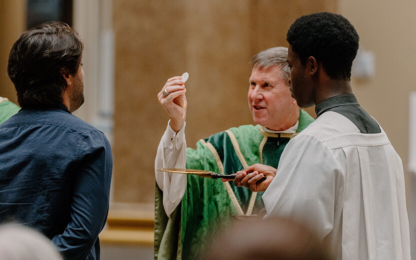 Most Reverend J. Mark Spalding, Bishop of Nashville, distributing the Eucharist during a Catholic Mass