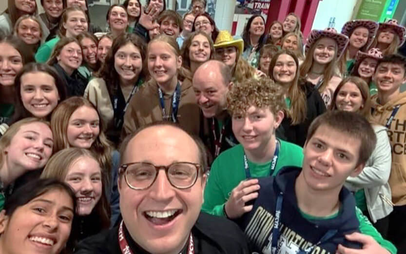 a group selfie of teen students