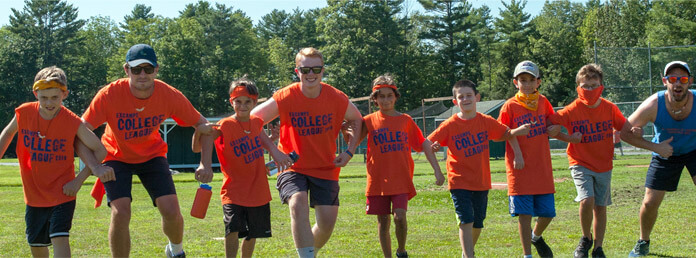 camp boys in orange shirts