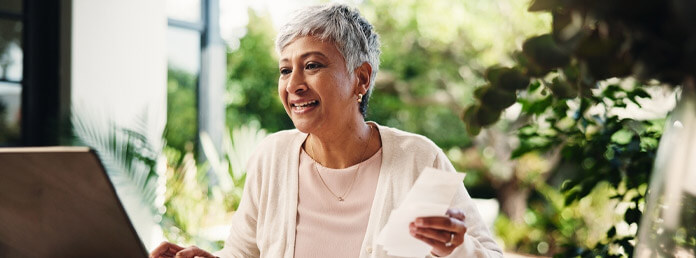 senior woman working on her laptop
