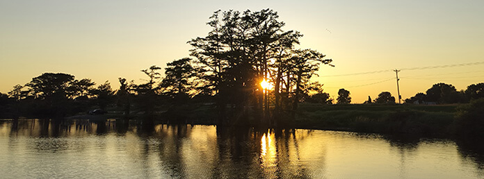 Sunset behind a lake