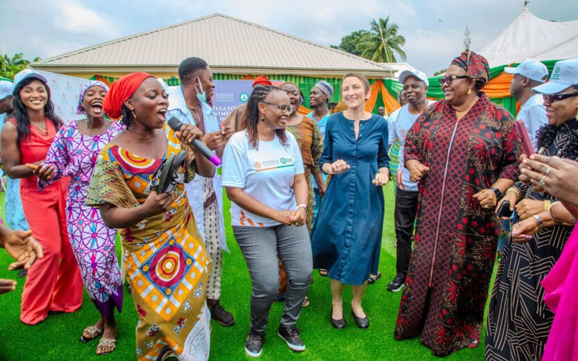 women singing and dancing