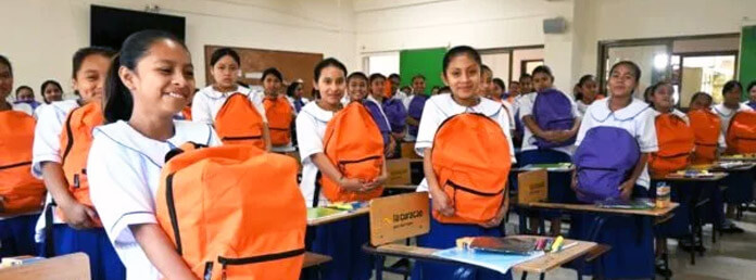school kids with new backpacks