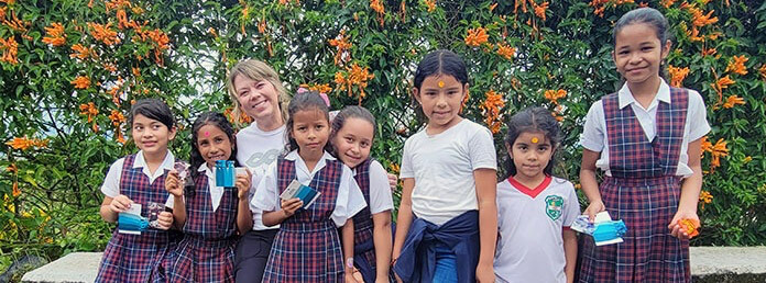 schoolgirls in uniform with snacks