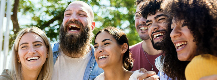 group of adults smiling