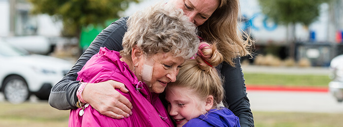 Multi-generational family embracing