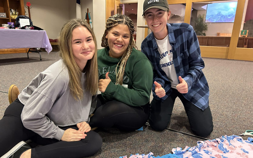 teens making blankets