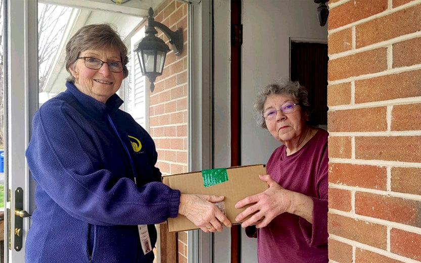 woman delivering meal