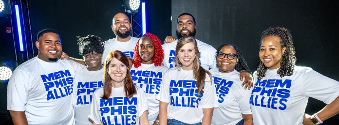 group shot indoors with stage lighting