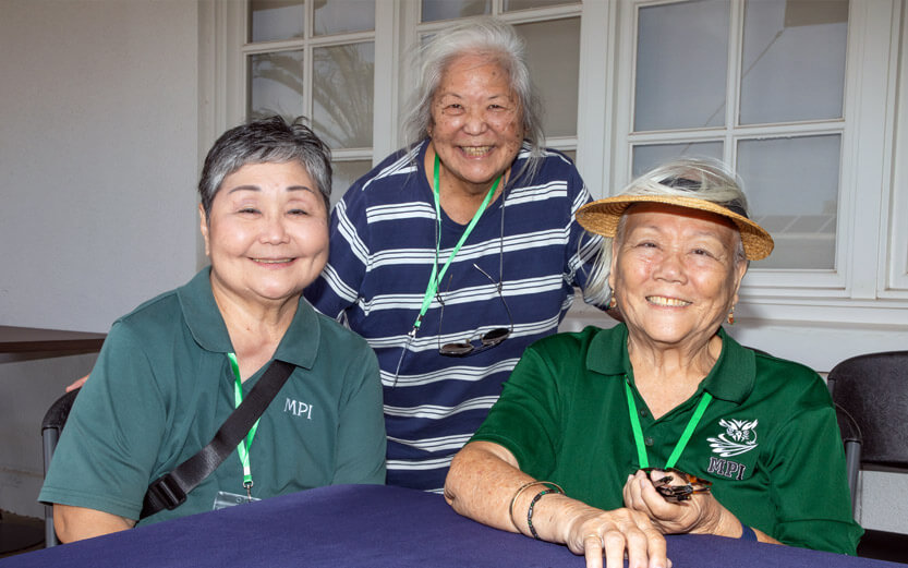 three senior women smiling