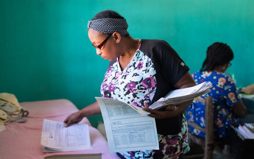 midwife team member looking through patient charts