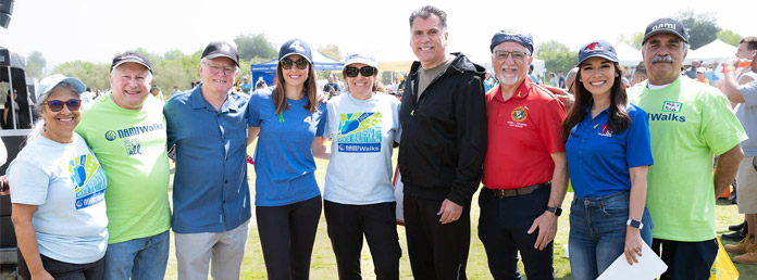 a group shot of nine people at a NAMIWalks event