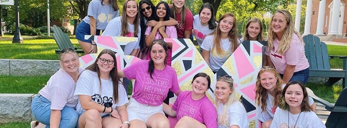 Phi Mu members posing for a photo