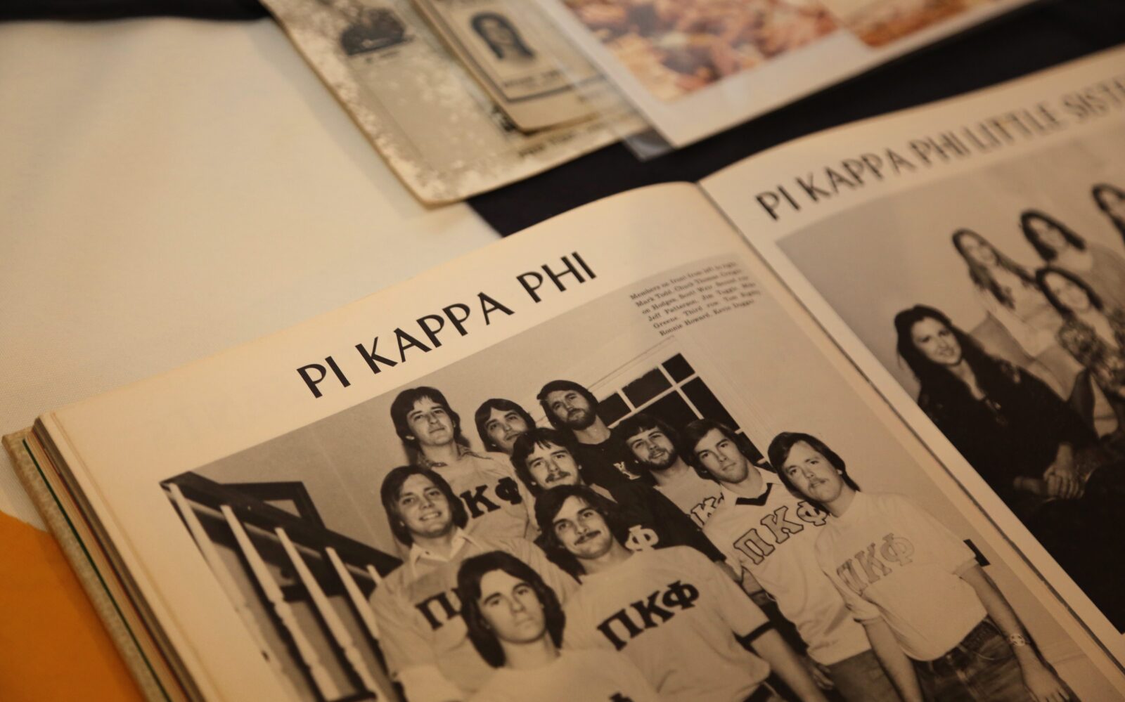 Vintage yearbooks with photos of Pi Kappa Phi members