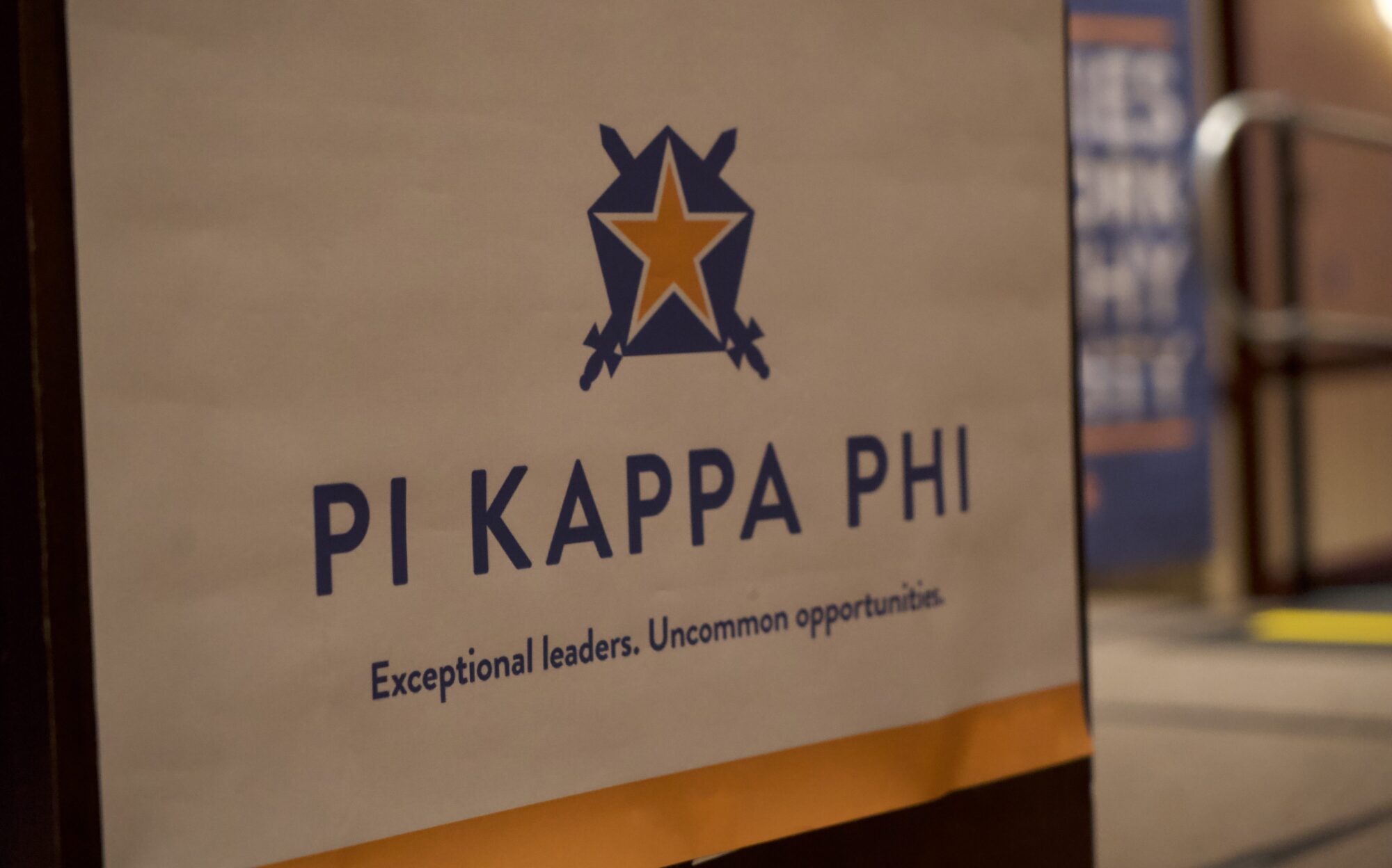 A sign that says "Pi Kappa Phi. Exceptional leaders. Uncommon opportunities.