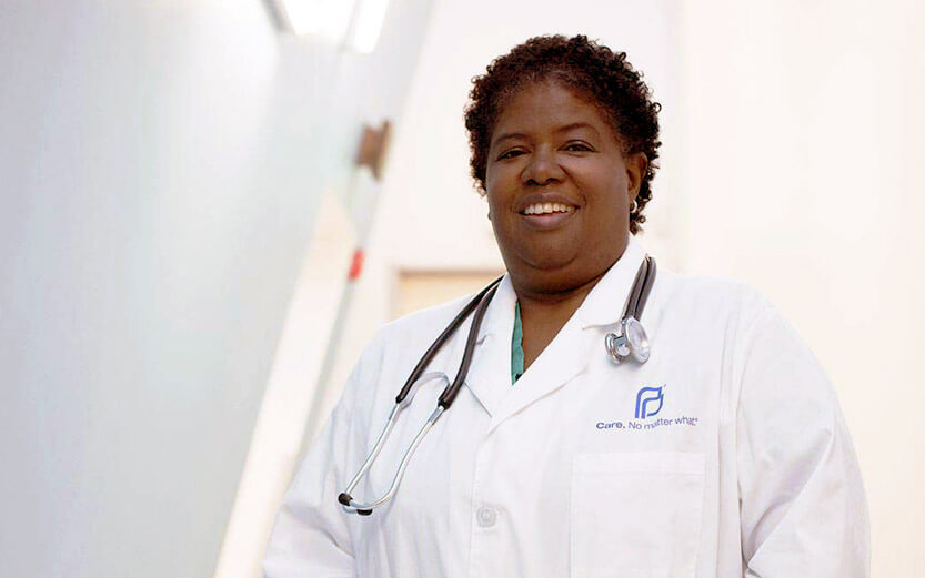 a Planned Parenthood doctor smiling