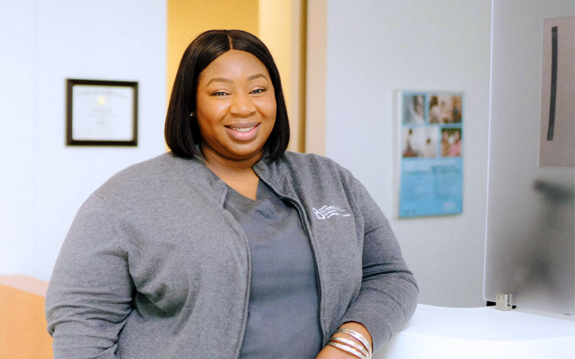 a Planned Parenthood office worker smiling
