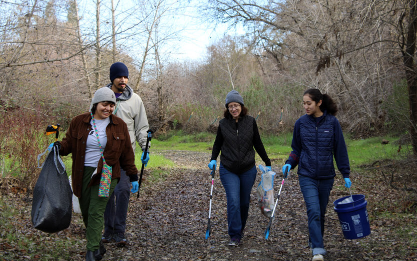 volunteers collecting trash