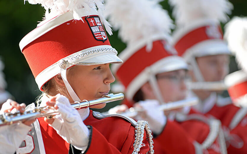 marching band member playing the flute