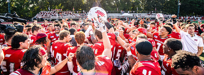 football team celebrating a win