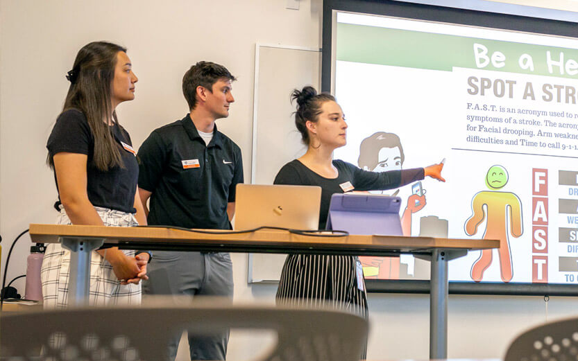 three people giving a presentation on BEFAST