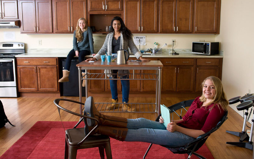 three students at the school cafe