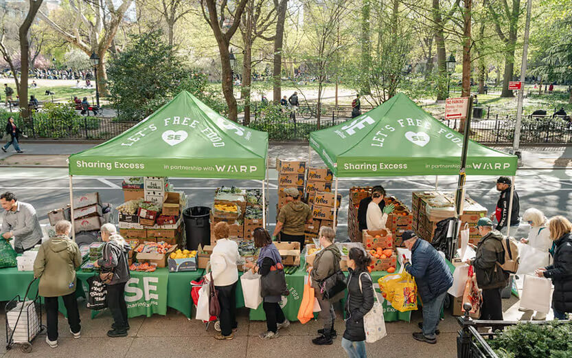 wide shot of a sharing excess food distribution event