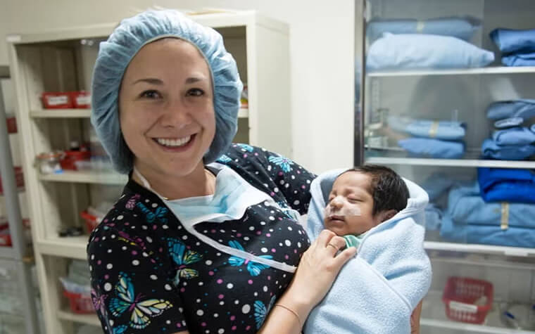 Child and nurse after surgery
