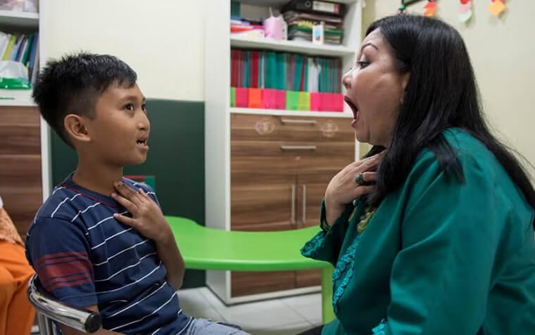 Child in speech therapy