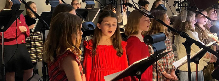 girls singing in a choir