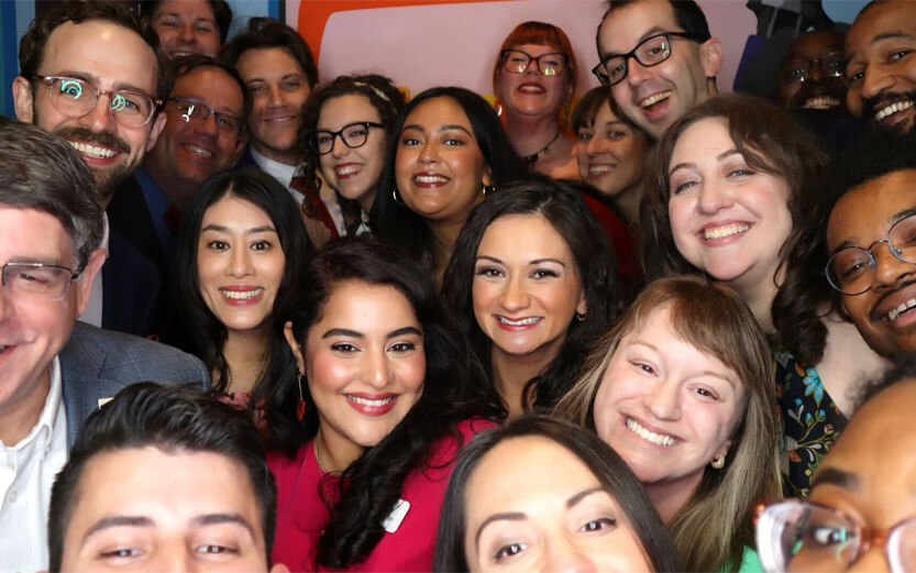 a close up group shot of the stlpr team