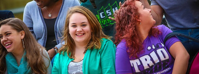 a group of female students smiling