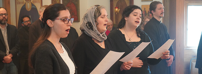 people singing in a choir