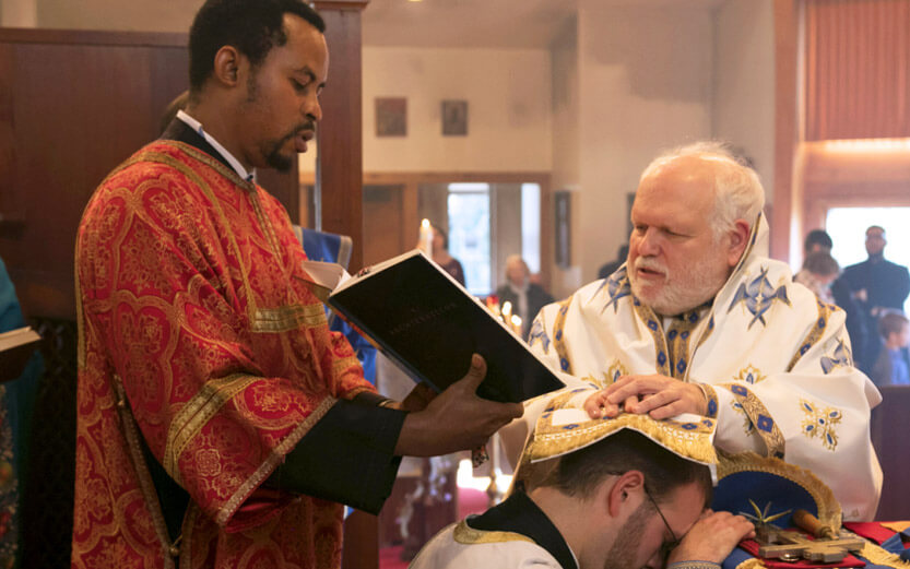 two clergy members performing a ceremony