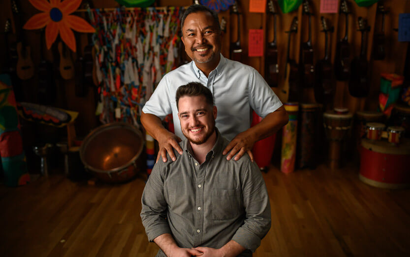 an LGBTQ+ person with their supportive father