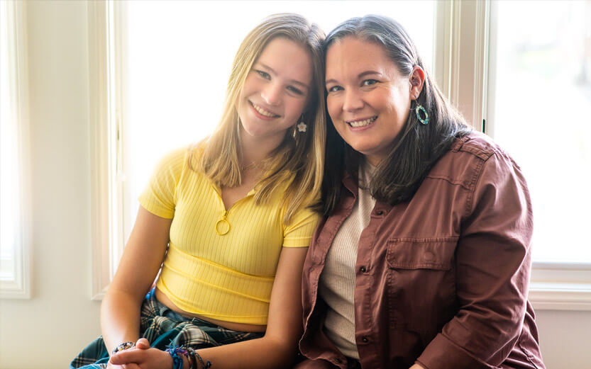 an LGBTQ+ person with their supportive mother
